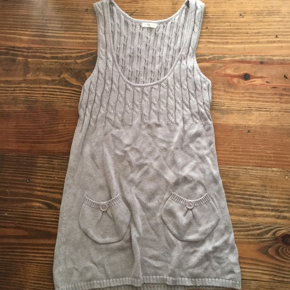 Gray sweater to layer over a tee or a dress shirt.